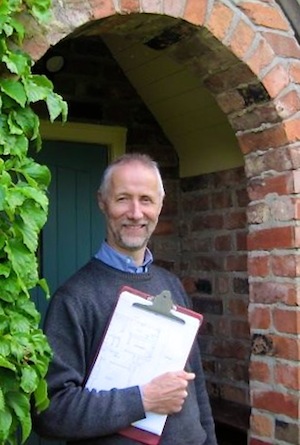 Architect Andy Grundy with clipboard